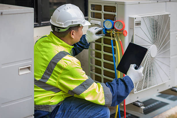 Professional Air Conditioning Repair technician working in Fostoria, IA